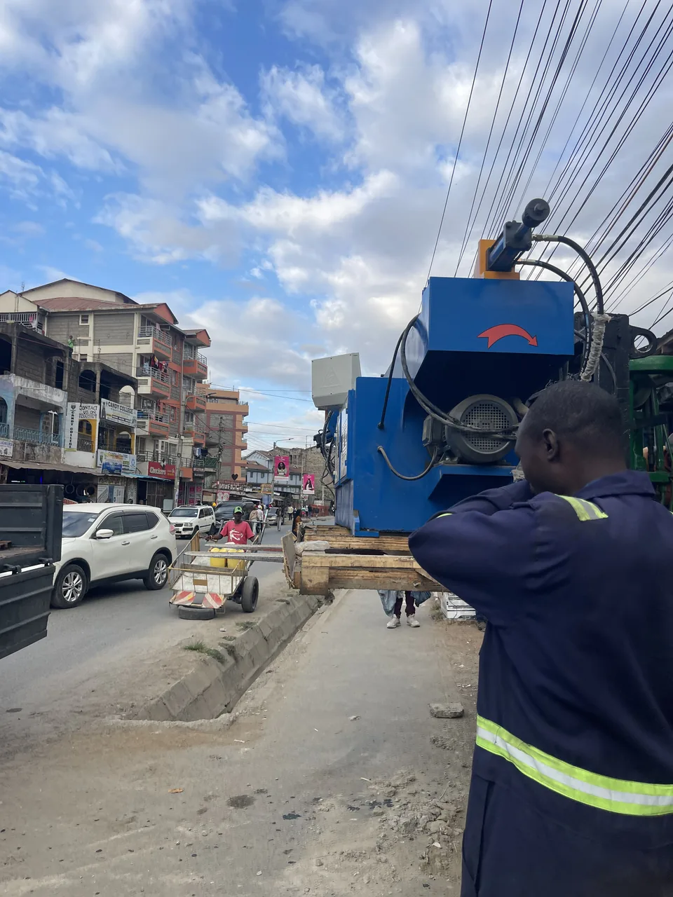 Close view of blue equipment being loaded for a stock run in Kenya