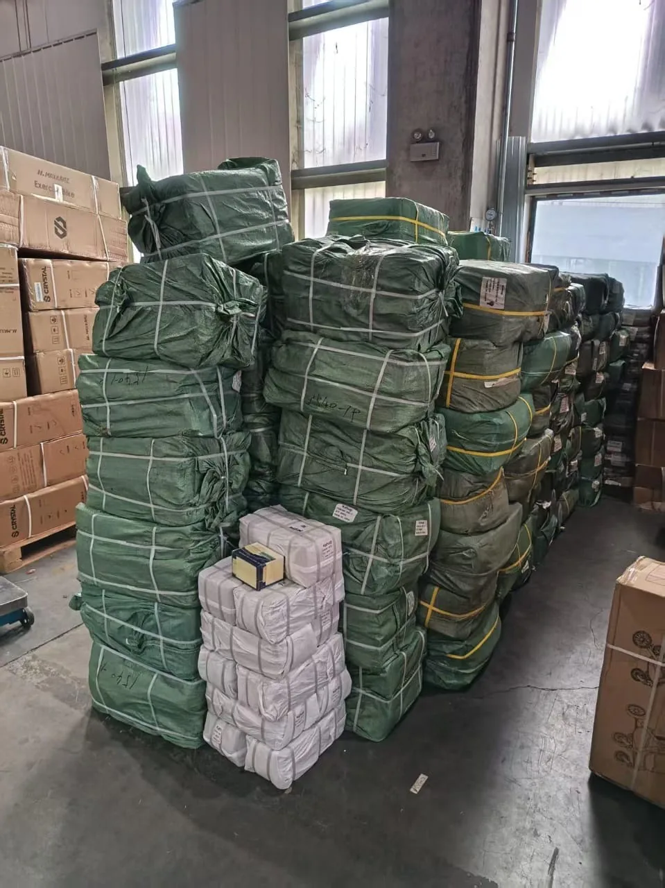 Wrapped stock bundles prepared in a Kenya supply shop